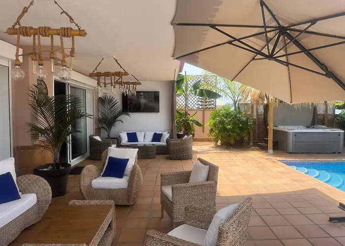 Blossom In The Beautiful Area Of Puerto Santiago Tenerife With 5 Bedrooms For Up To 10 Guests Private Swimming Pool And Many Other Activities To Entertain The Family Secure Parking For 2 Cars And Disabled Access Throughout * Puerto de Santiago (Tenerife)