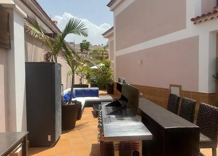 Villa Blossom In The Beautiful Area Of Puerto Santiago Tenerife With 5 Bedrooms For Up To 10 Guests Private Swimming Pool And Many Other Activities To Entertain The Family Secure Parking For 2 Cars And Disabled Access Throughout *