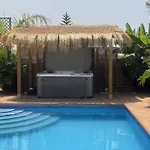 Blossom In The Beautiful Area Of Puerto Santiago Tenerife With 5 Bedrooms For Up To 10 Guests Private Swimming Pool And Many Other Activities To Entertain The Family Secure Parking For 2 Cars And Disabled Access Throughout Puerto de Santiago (Tenerife)