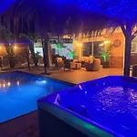 Villa Blossom In The Beautiful Area Of Puerto Santiago Tenerife With 5 Bedrooms For Up To 10 Guests Private Swimming Pool And Many Other Activities To Entertain The Family Secure Parking For 2 Cars And Disabled Access Throughout Puerto de Santiago (Tenerife)