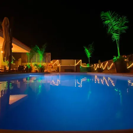 Blossom In The Beautiful Area Of Puerto Santiago Tenerife With 5 Bedrooms For Up To 10 Guests Private Swimming Pool And Many Other Activities To Entertain The Family Secure Parking For 2 Cars And Disabled Access Throughout
