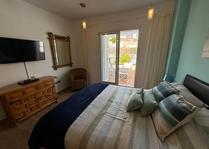 Blossom In The Beautiful Area Of Puerto Santiago Tenerife With 5 Bedrooms For Up To 10 Guests Private Swimming Pool And Many Other Activities To Entertain The Family Secure Parking For 2 Cars And Disabled Access Throughout *
