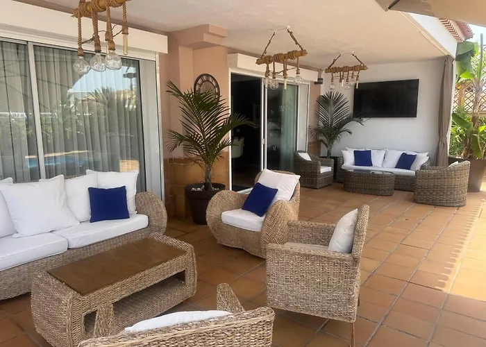 Blossom In The Beautiful Area Of Puerto Santiago Tenerife With 5 Bedrooms For Up To 10 Guests Private Swimming Pool And Many Other Activities To Entertain The Family Secure Parking For 2 Cars And Disabled Access Throughout Villa *