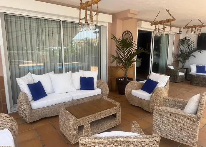 Blossom In The Beautiful Area Of Puerto Santiago Tenerife With 5 Bedrooms For Up To 10 Guests Private Swimming Pool And Many Other Activities To Entertain The Family Secure Parking For 2 Cars And Disabled Access Throughout