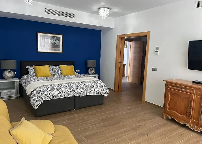 Blossom In The Beautiful Area Of Puerto Santiago Tenerife With 5 Bedrooms For Up To 10 Guests Private Swimming Pool And Many Other Activities To Entertain The Family Secure Parking For 2 Cars And Disabled Access Throughout Villa *