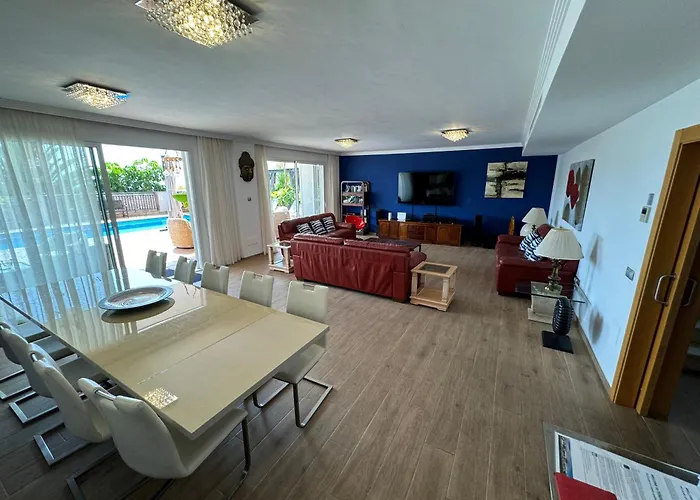 Blossom In The Beautiful Area Of Puerto Santiago Tenerife With 5 Bedrooms For Up To 10 Guests Private Swimming Pool And Many Other Activities To Entertain The Family Secure Parking For 2 Cars And Disabled Access Throughout * Puerto de Santiago