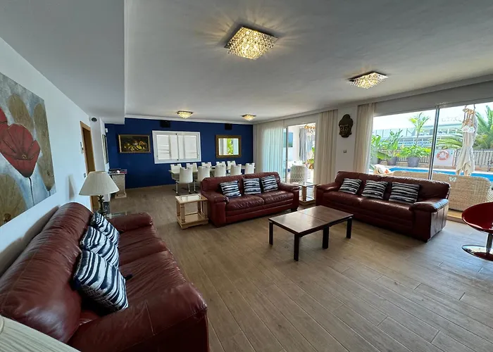 Villa Blossom In The Beautiful Area Of Puerto Santiago Tenerife With 5 Bedrooms For Up To 10 Guests Private Swimming Pool And Many Other Activities To Entertain The Family Secure Parking For 2 Cars And Disabled Access Throughout *