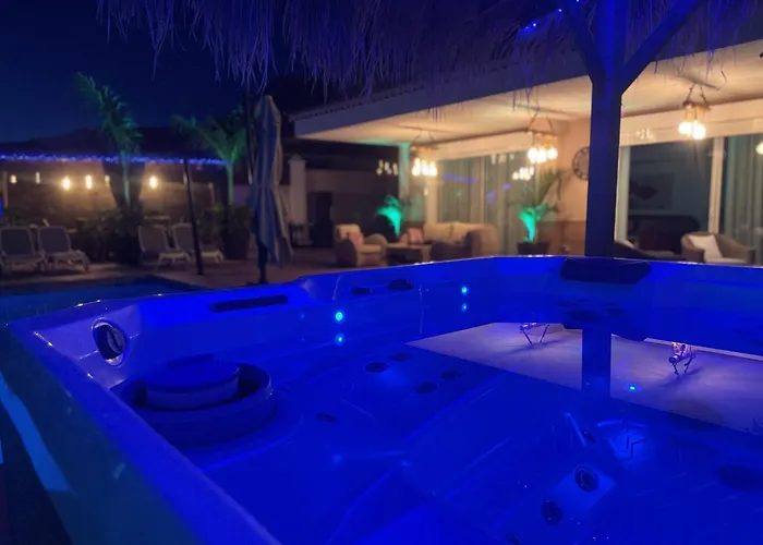 Villa Blossom In The Beautiful Area Of Puerto Santiago Tenerife With 5 Bedrooms For Up To 10 Guests Private Swimming Pool And Many Other Activities To Entertain The Family Secure Parking For 2 Cars And Disabled Access Throughout *