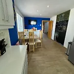Blossom In The Beautiful Area Of Puerto Santiago Tenerife With 5 Bedrooms For Up To 10 Guests Private Swimming Pool And Many Other Activities To Entertain The Family Secure Parking For 2 Cars And Disabled Access Throughout Villa