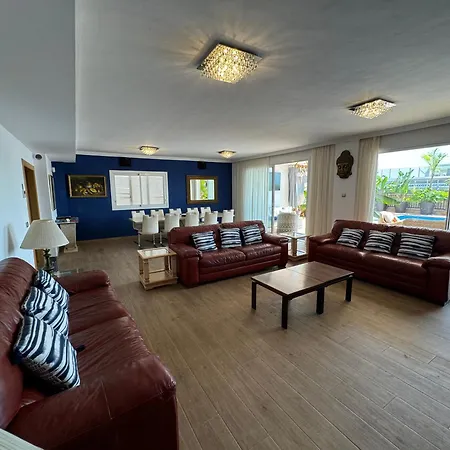 Villa Blossom In The Beautiful Area Of Puerto Santiago Tenerife With 5 Bedrooms For Up To 10 Guests Private Swimming Pool And Many Other Activities To Entertain The Family Secure Parking For 2 Cars And Disabled Access Throughout *