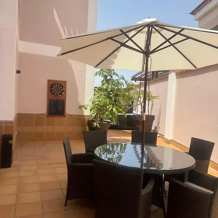 Villa Blossom In The Beautiful Area Of Puerto Santiago Tenerife With 5 Bedrooms For Up To 10 Guests Private Swimming Pool And Many Other Activities To Entertain The Family Secure Parking For 2 Cars And Disabled Access Throughout Puerto de Santiago (Tenerife)
