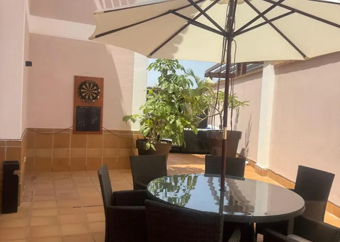 Villa Blossom In The Beautiful Area Of Puerto Santiago Tenerife With 5 Bedrooms For Up To 10 Guests Private Swimming Pool And Many Other Activities To Entertain The Family Secure Parking For 2 Cars And Disabled Access Throughout Puerto de Santiago (Tenerife)