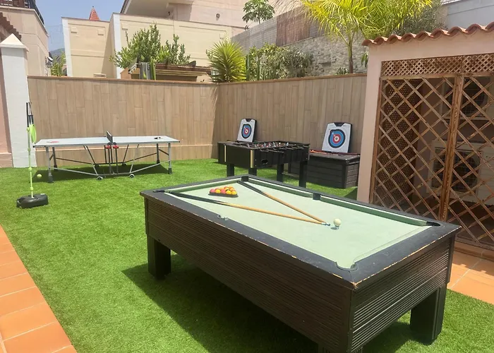 Villa Blossom In The Beautiful Area Of Puerto Santiago Tenerife With 5 Bedrooms For Up To 10 Guests Private Swimming Pool And Many Other Activities To Entertain The Family Secure Parking For 2 Cars And Disabled Access Throughout *